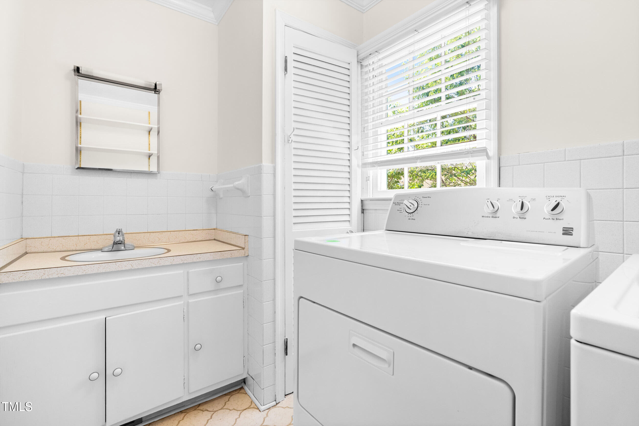 2143 Ridge Road Raleigh, NC 27607 - Photo 25 of 40 a utility room with dryer and washer