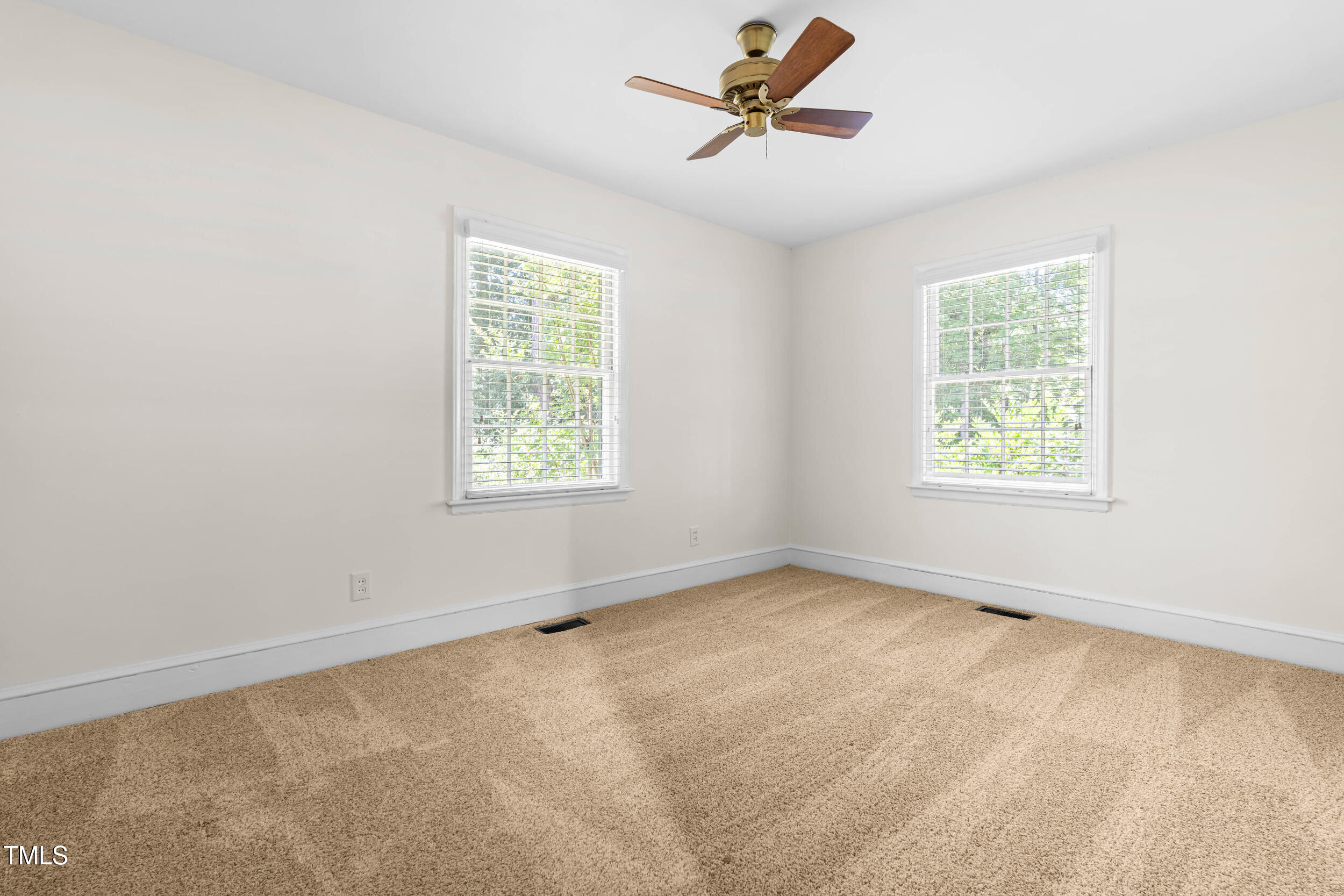 2143 Ridge Road Raleigh, NC 27607 - Photo 31 of 40 a view of an empty room with a window