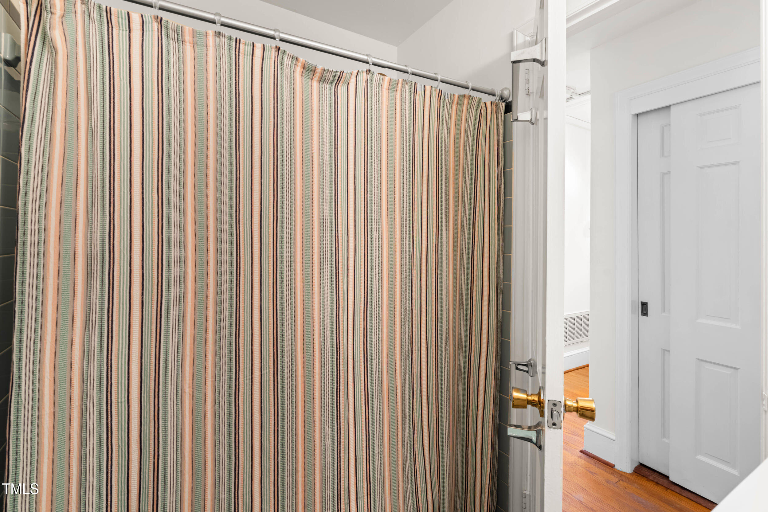 2143 Ridge Road Raleigh, NC 27607 - Photo 32 of 40 a view of a room with a wooden door