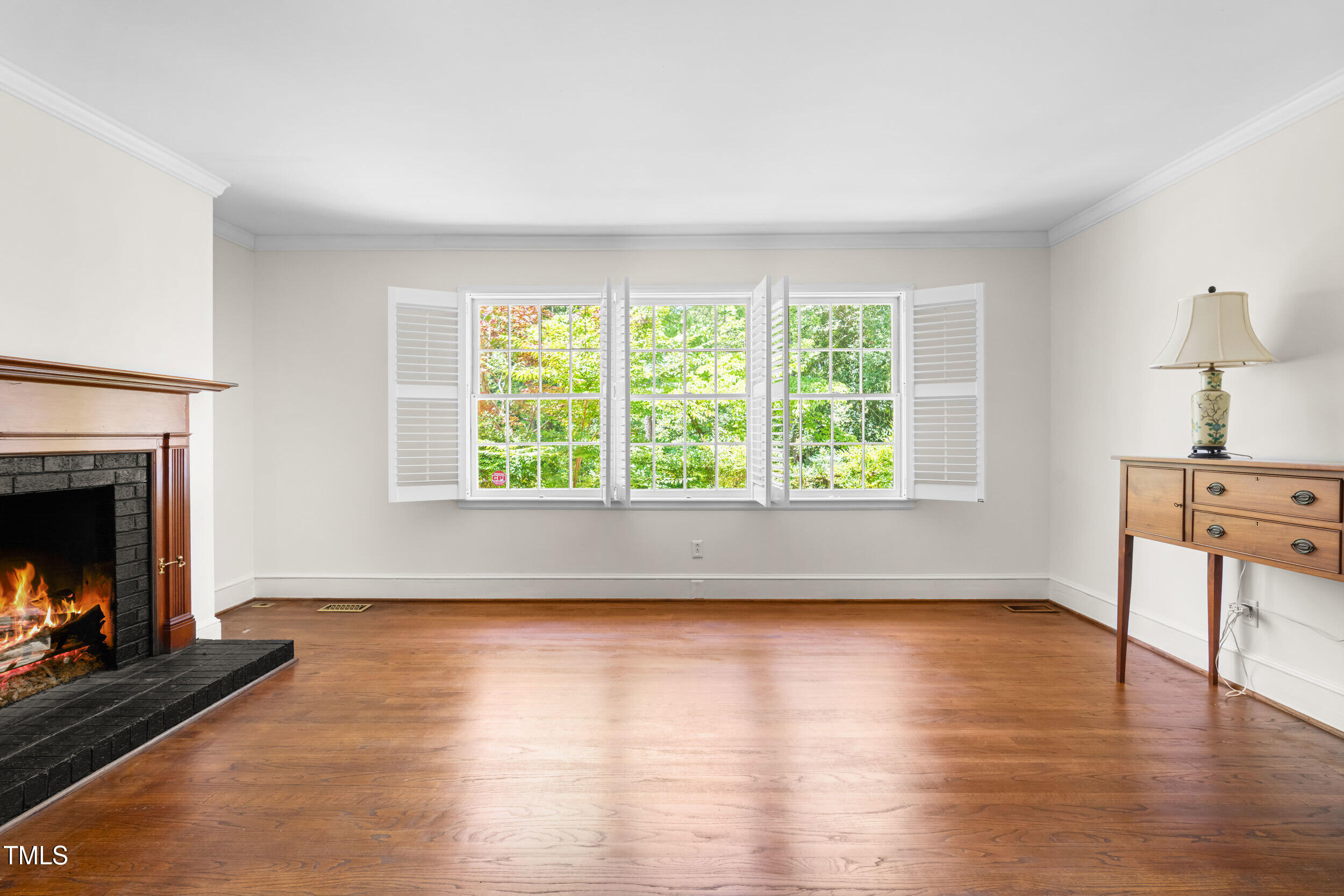 2143 Ridge Road Raleigh, NC 27607 - Photo 10 of 40 a living room with furniture and a fireplace