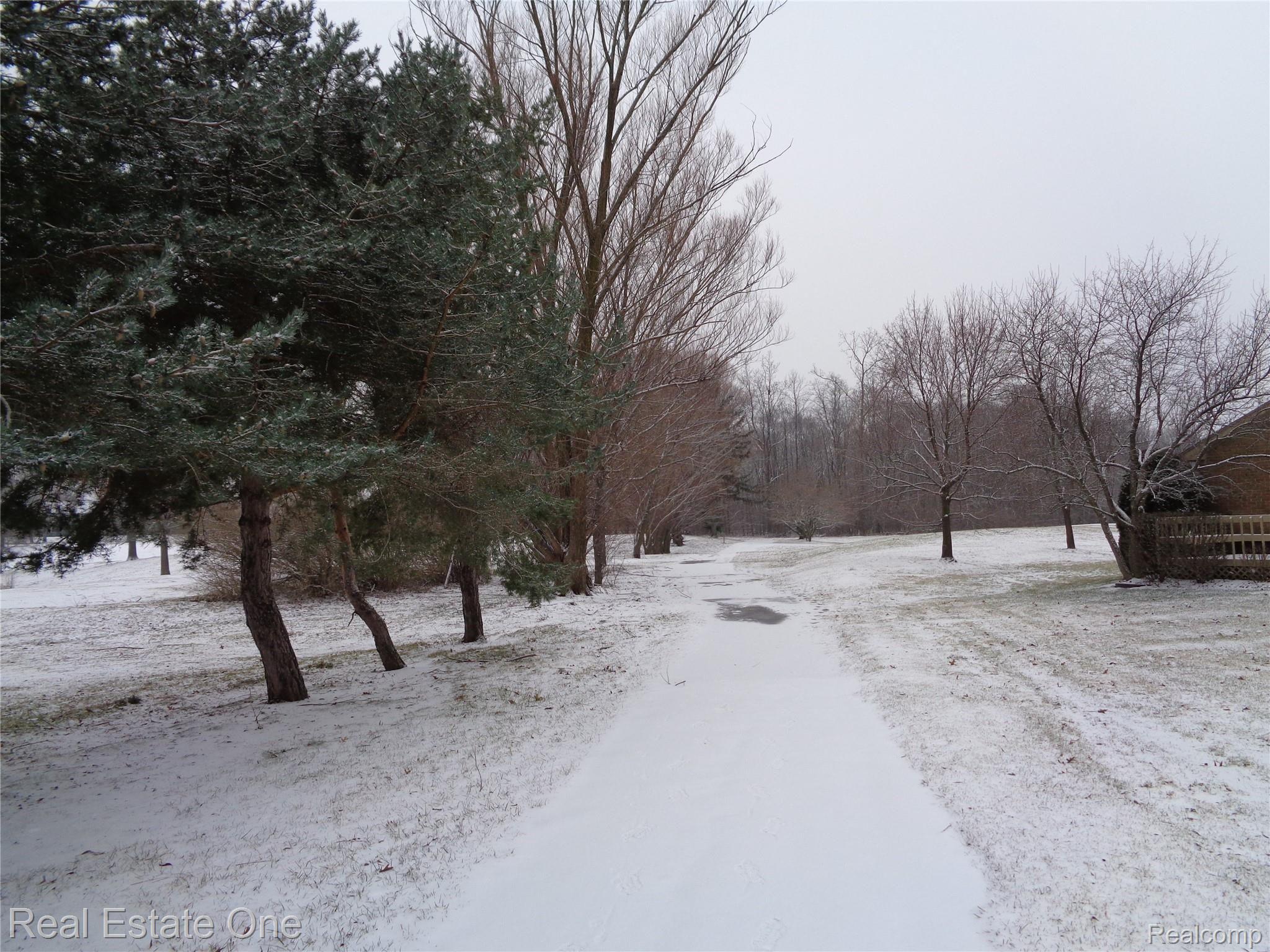 624 Tennyson, Unit 113 Rochester, MI 48307 - Photo 49 of 51 Walkway or cart path right behind your unit for great exercise as well.