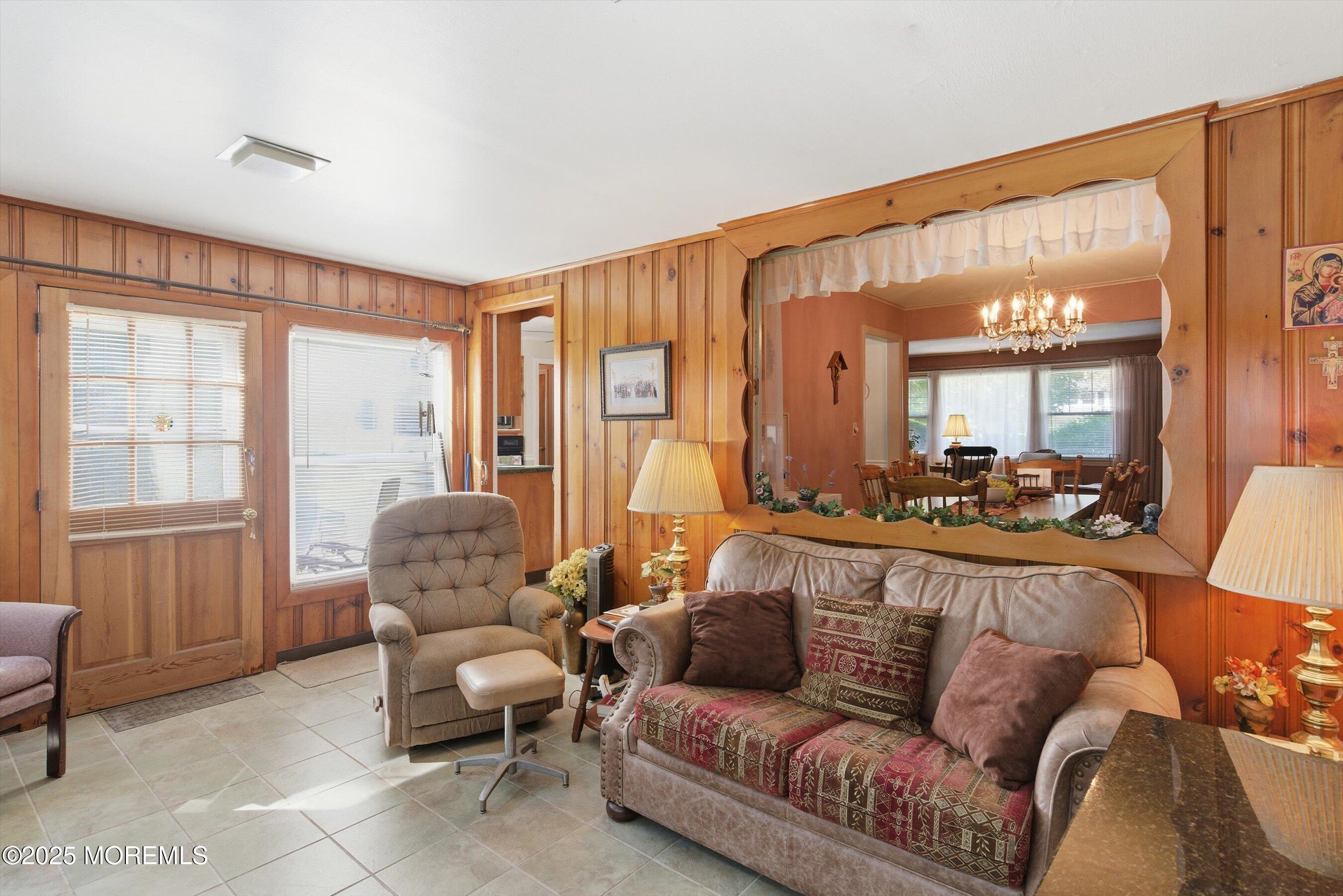 69 Harvard Road Fair Haven, NJ 07704 - Photo 12 of 30 a living room with furniture and a large window