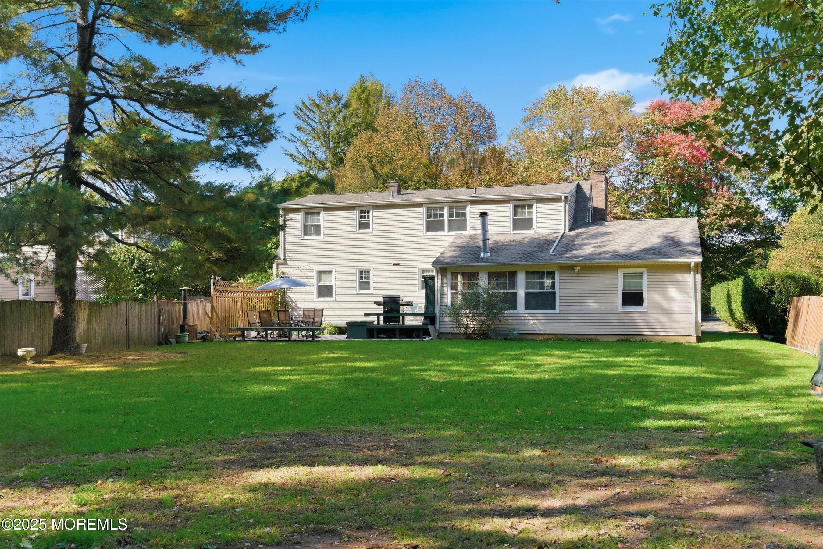 69 Harvard Road Fair Haven, NJ 07704 - Photo 26 of 30 a view of a house with a big yard