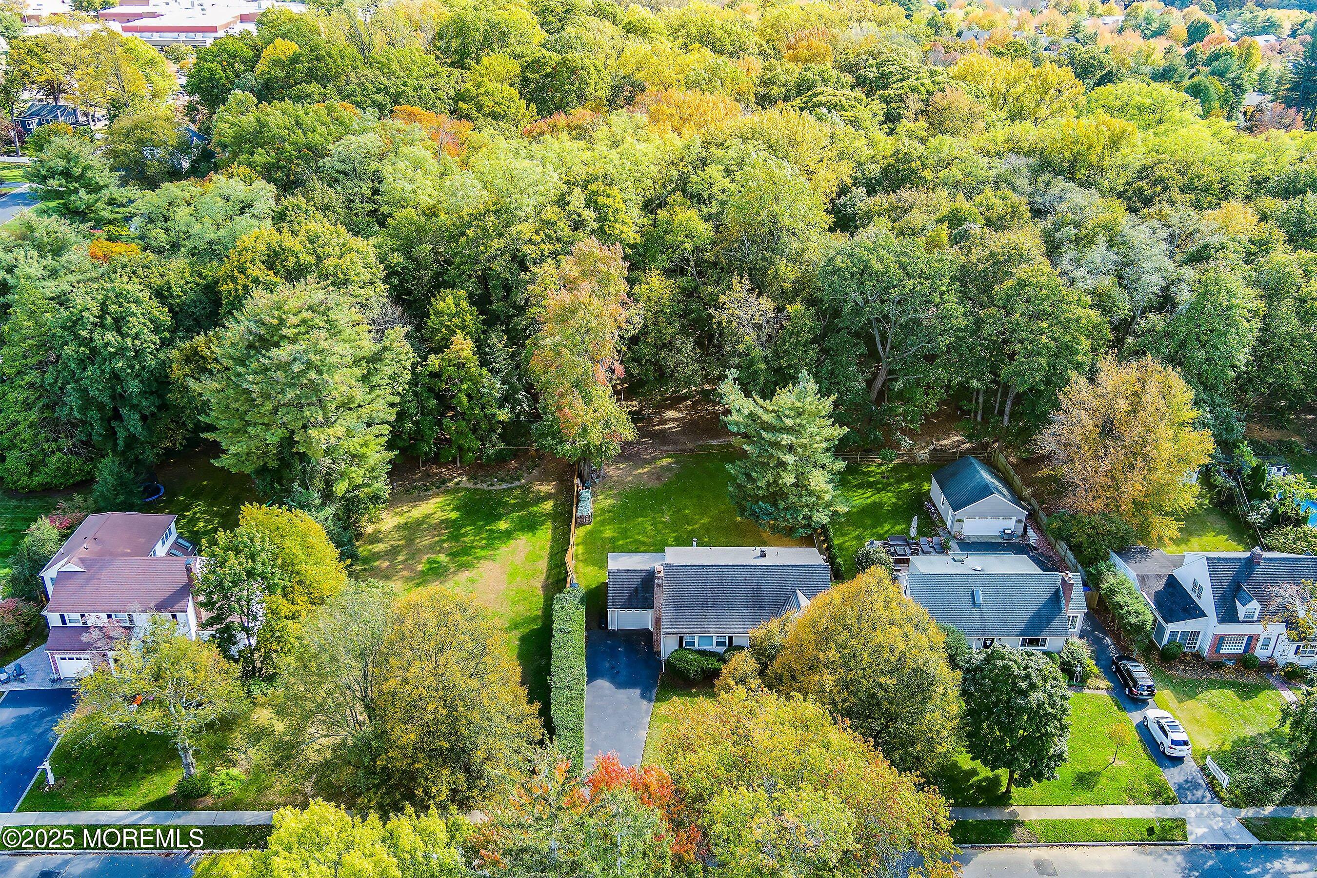 69 Harvard Road Fair Haven, NJ 07704 - Photo 30 of 30 an aerial view of a house with a yard