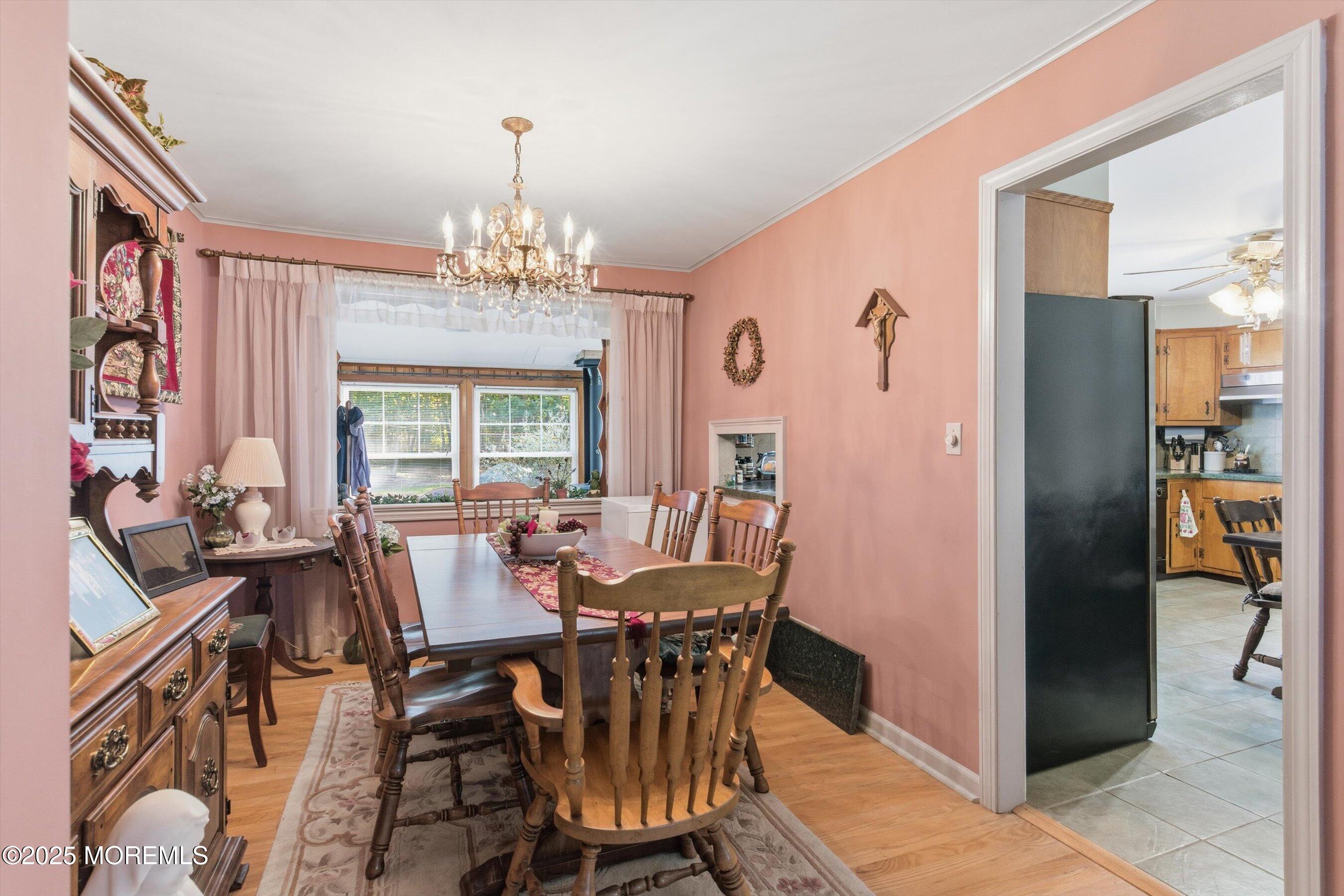 69 Harvard Road Fair Haven, NJ 07704 - Photo 7 of 30 a view of a dining room with furniture window and outside view