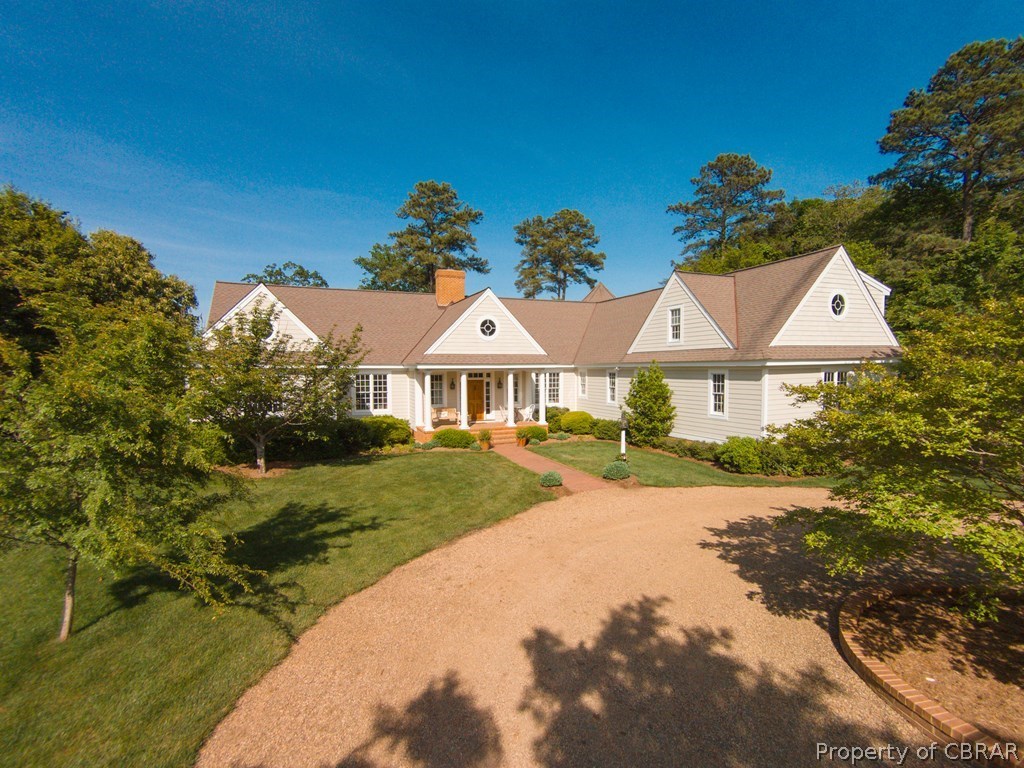 1193 West Point Road Lancaster, VA 22503 - Photo 13 of 50 a view of a white house with a yard