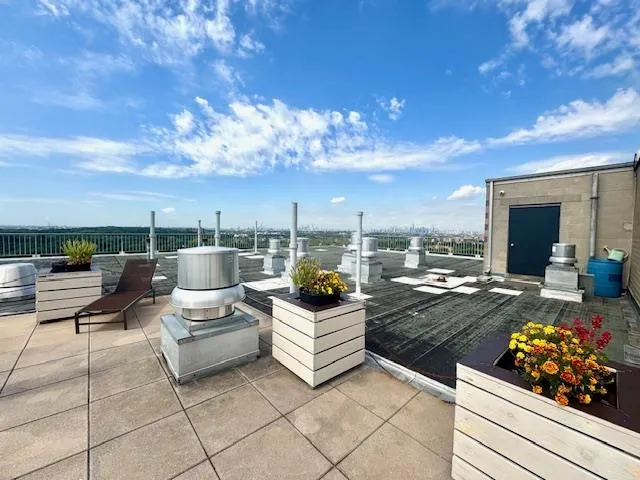 a view of a terrace with furniture