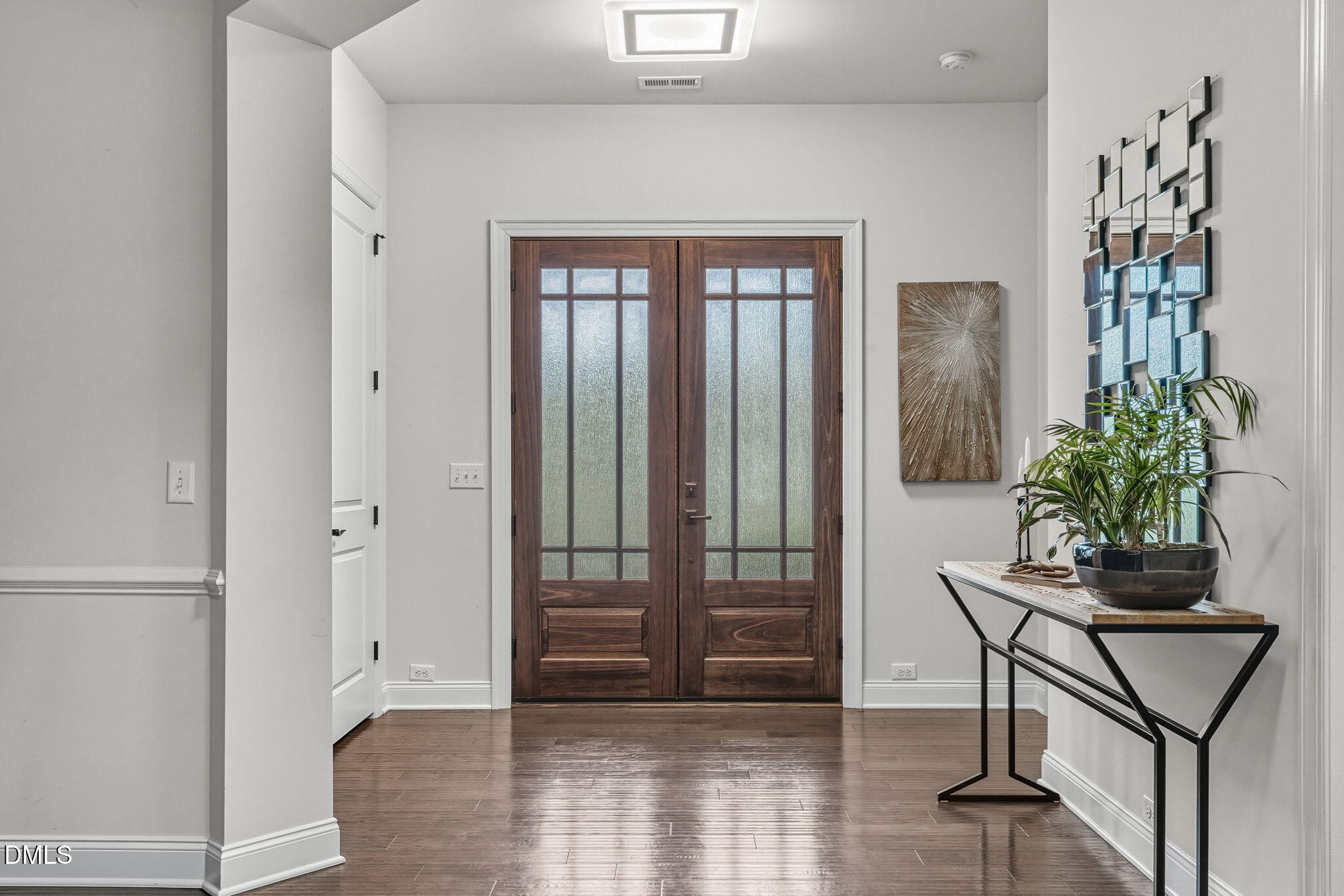 2613 Beckwith Road Apex, NC 27523 - Photo 4 of 73 a view of a livingroom with furniture and front door
