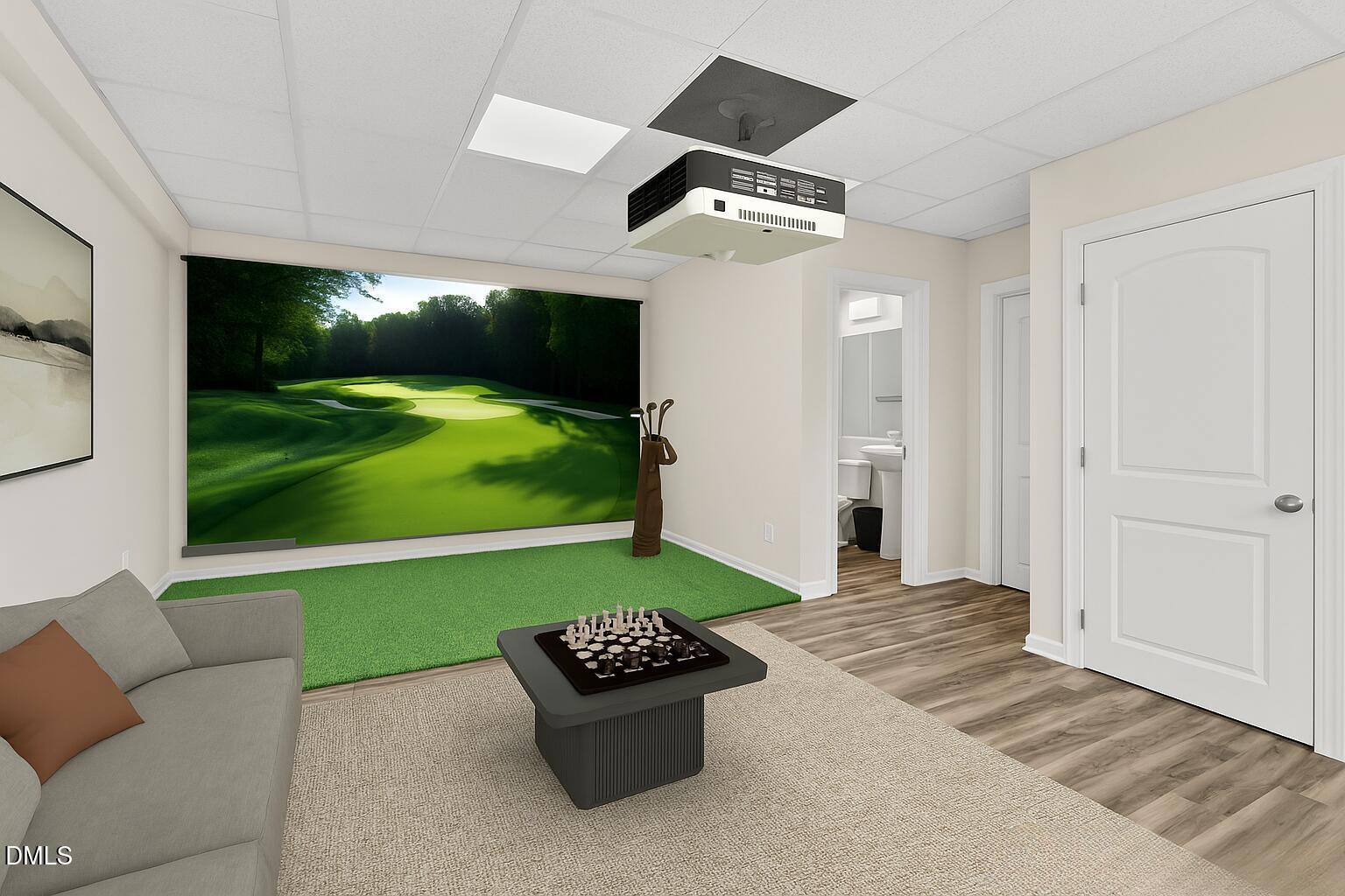 2613 Beckwith Road Apex, NC 27523 - Photo 46 of 73 a living room with a garden and a flat screen tv