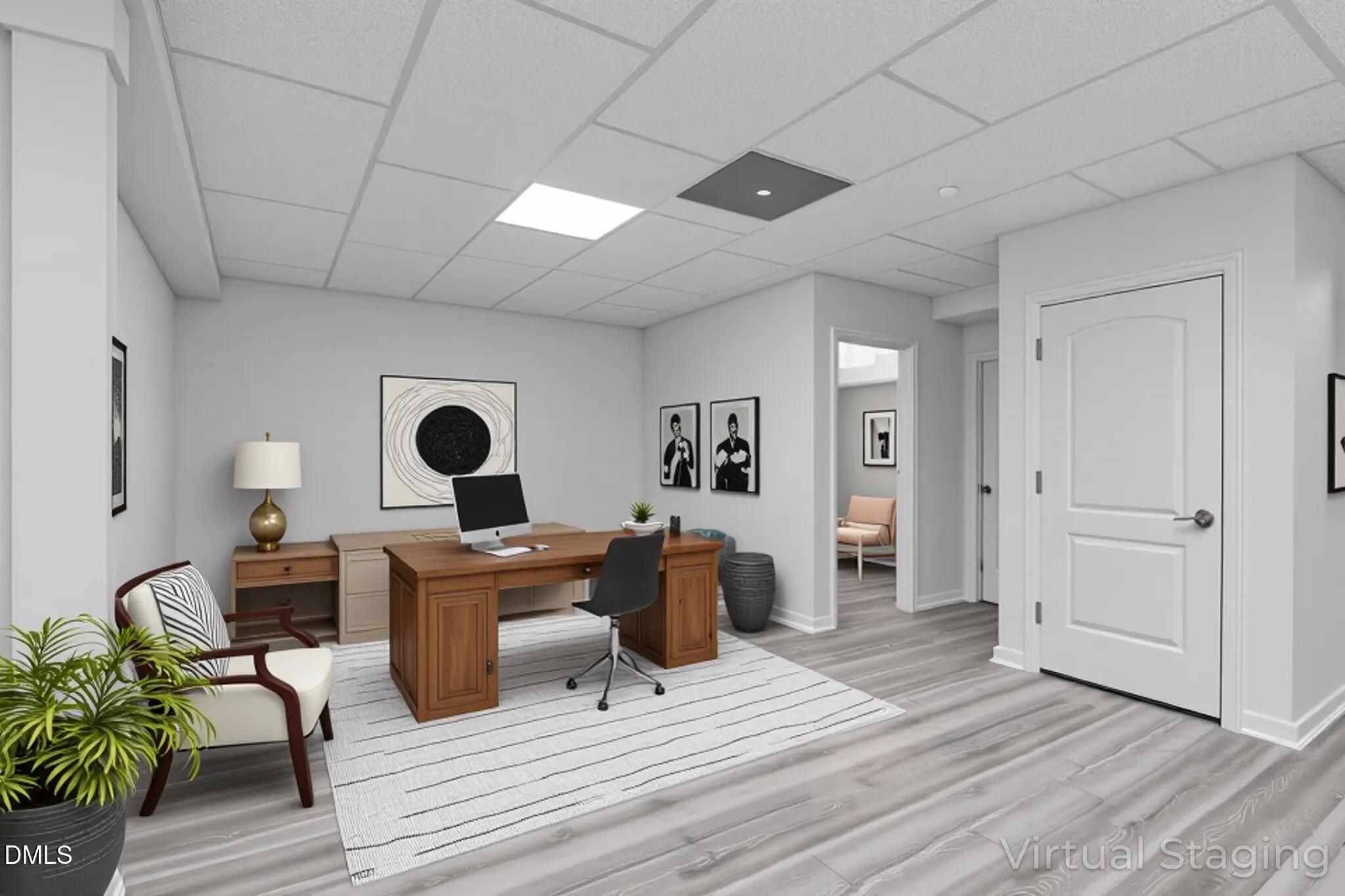 2613 Beckwith Road Apex, NC 27523 - Photo 47 of 73 a view of a workspace with furniture and wooden floor