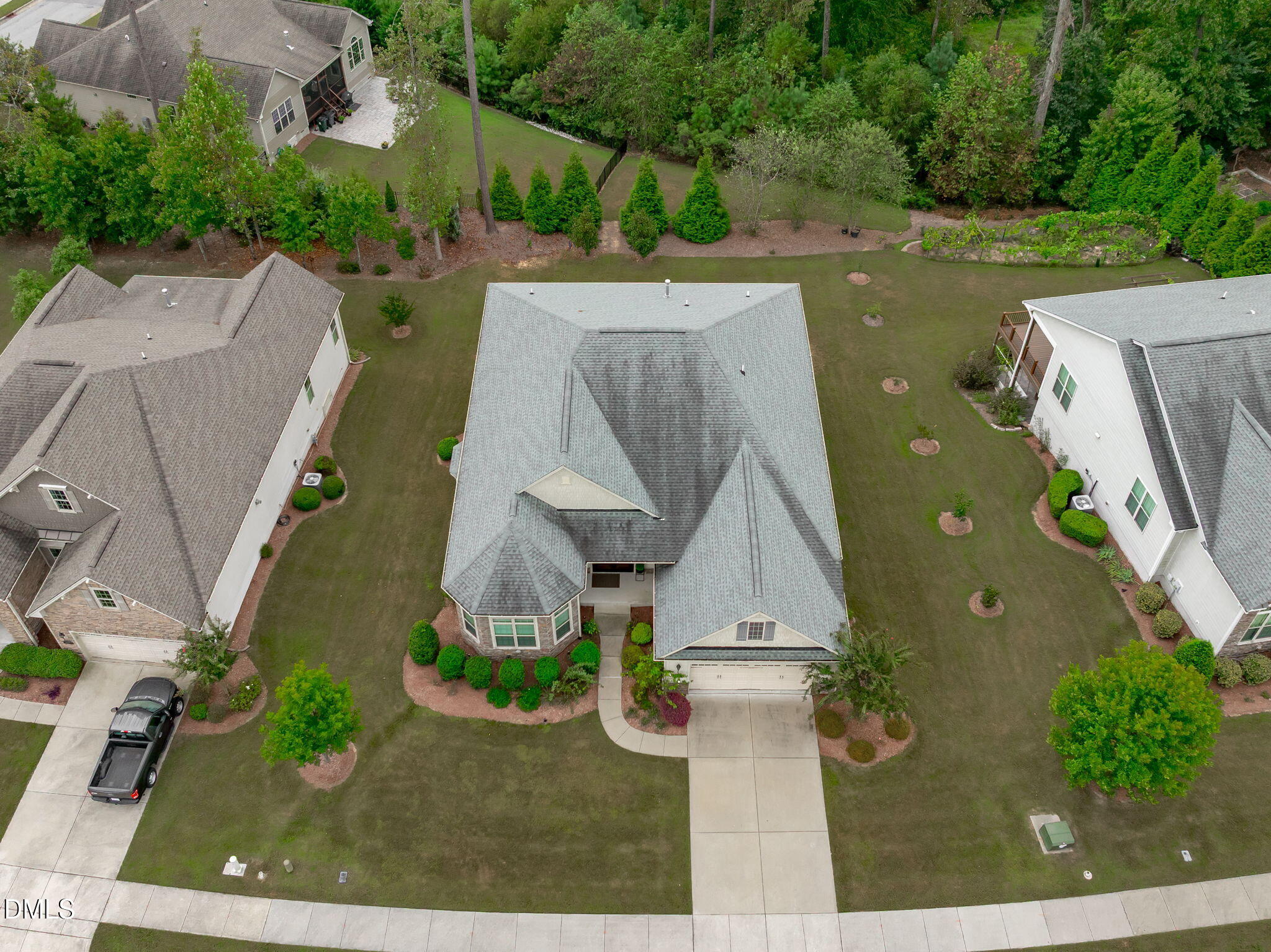 2613 Beckwith Road Apex, NC 27523 - Photo 68 of 73 an aerial view of a house with a garden