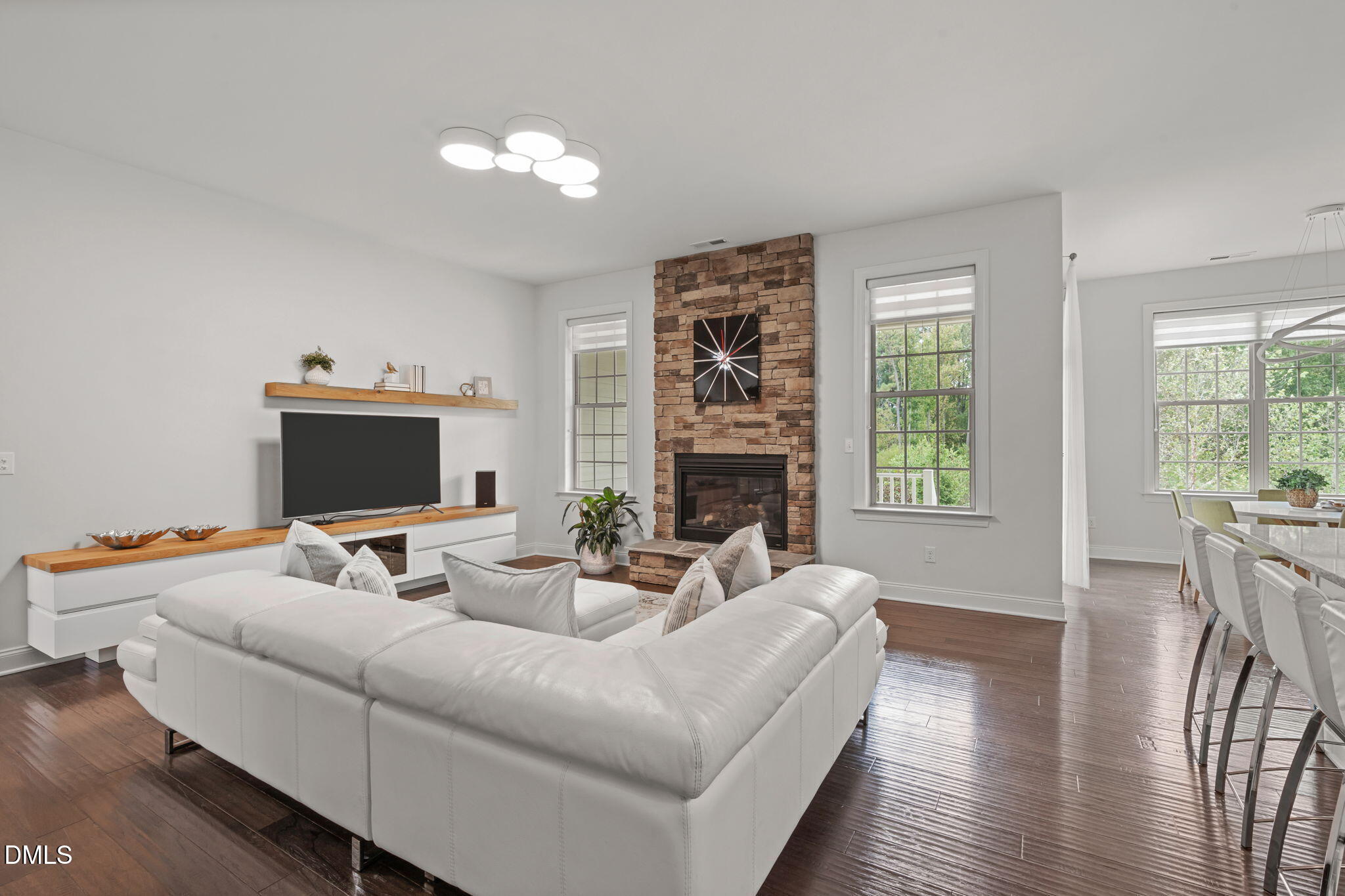 2613 Beckwith Road Apex, NC 27523 - Photo 9 of 73 a living room with furniture and a flat screen tv