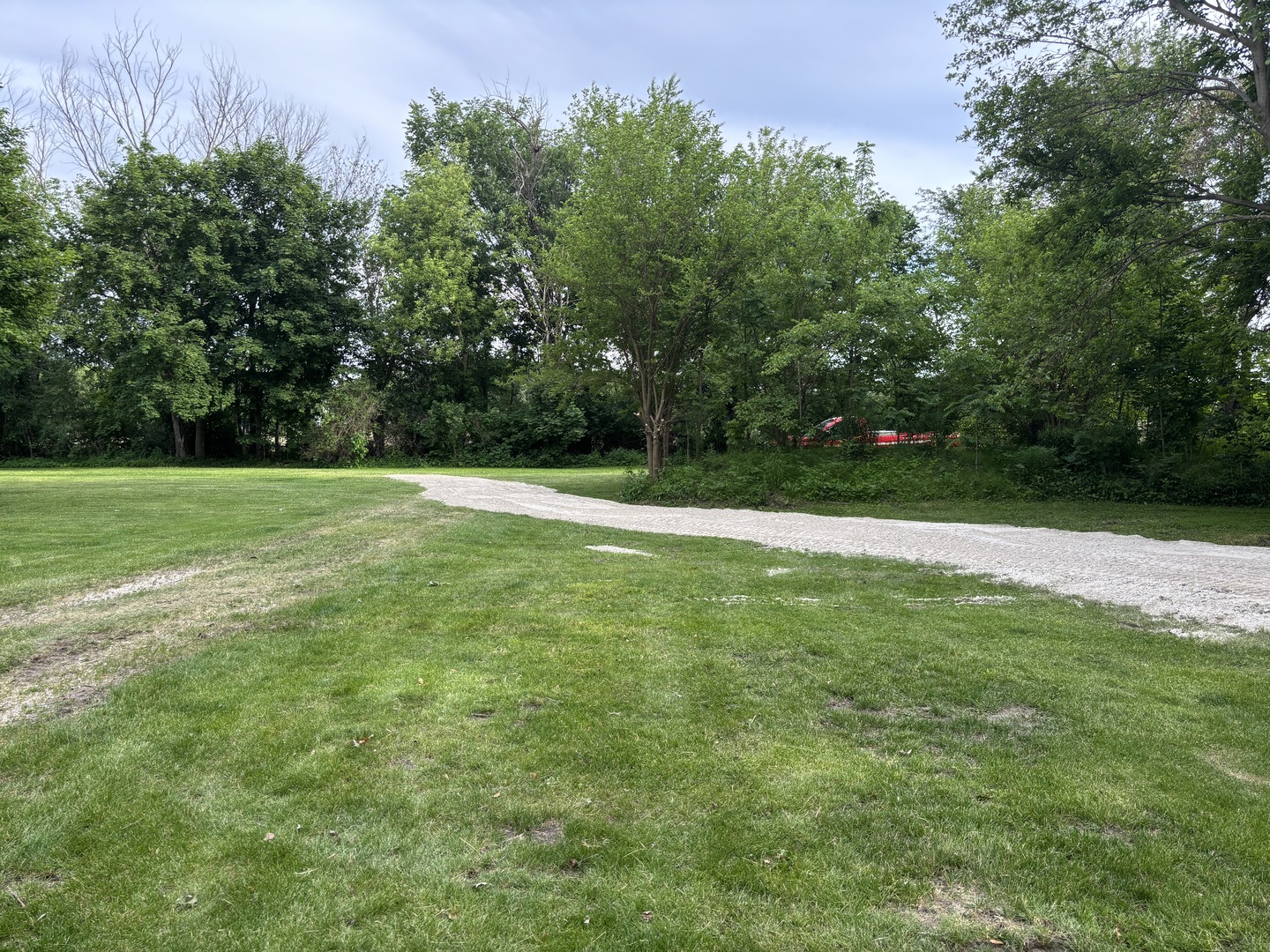 403 Rhodes Avenue Big Rock, IL 60511 - Photo 47 of 48 a view of a field of grass and trees