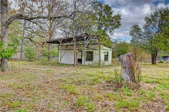 a view of outdoor space and covered with trees