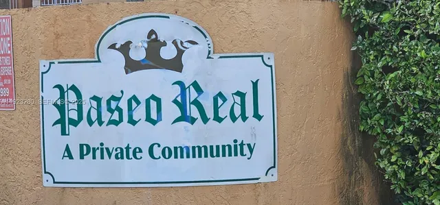 a view of a door with a sign broad