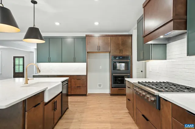 a bathroom with a sink a mirror and a toilet