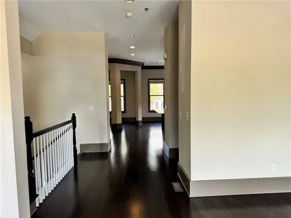 a view of entryway with wooden floor