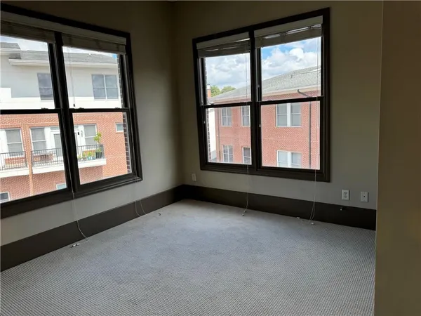 a front view of a building with street view