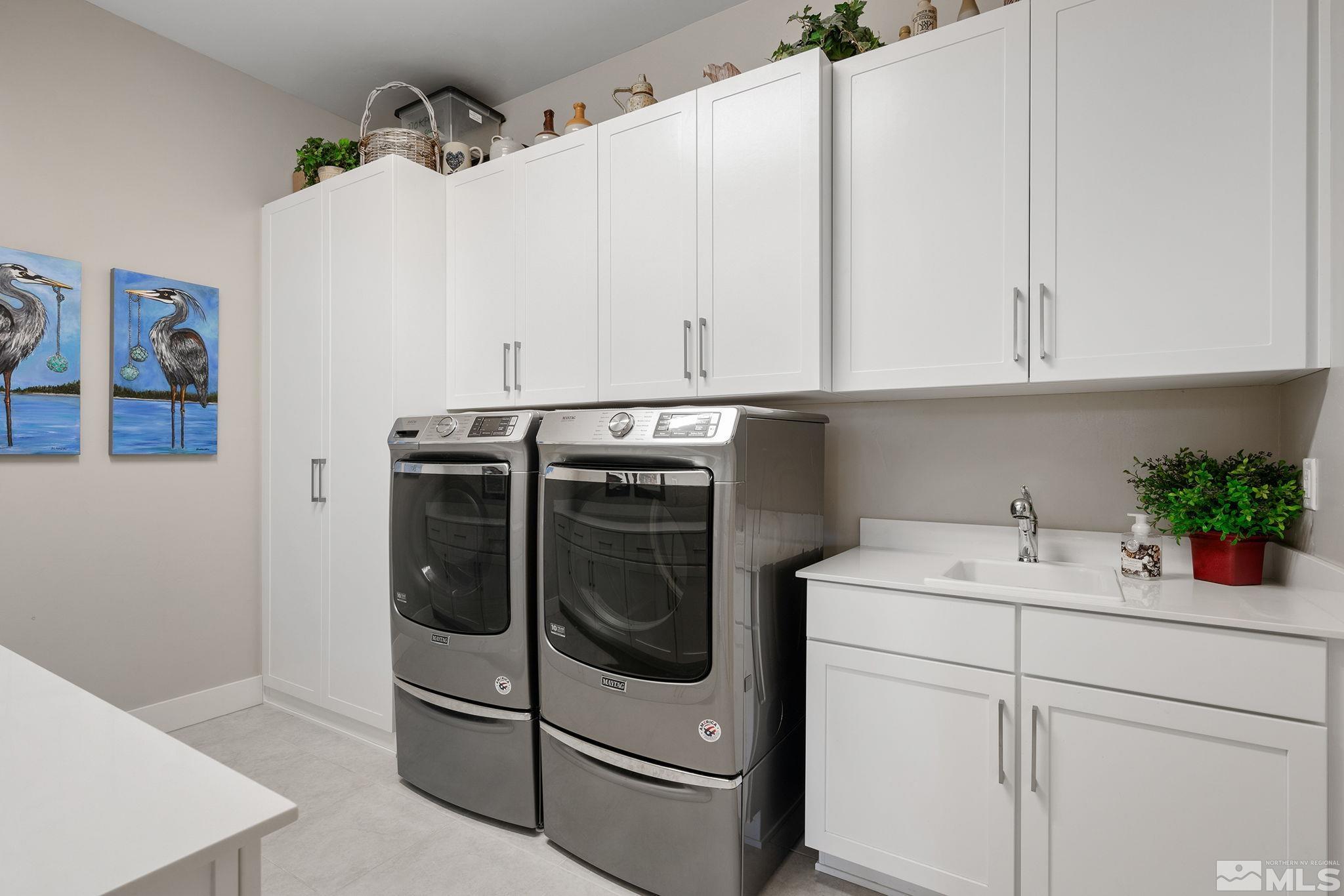 3011 Feathertop Drive Reno, NV 89521 - Photo 24 of 40 a utility room with dryer and washer