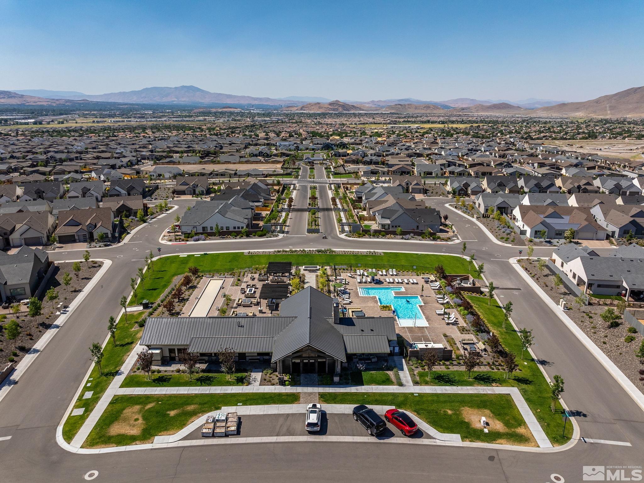 3011 Feathertop Drive Reno, NV 89521 - Photo 36 of 40 an aerial view of a tennis ground and a cars park