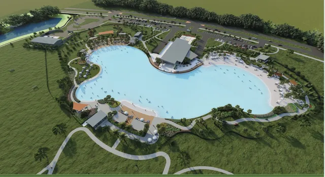 an aerial view of a swimming pool patio and lake view