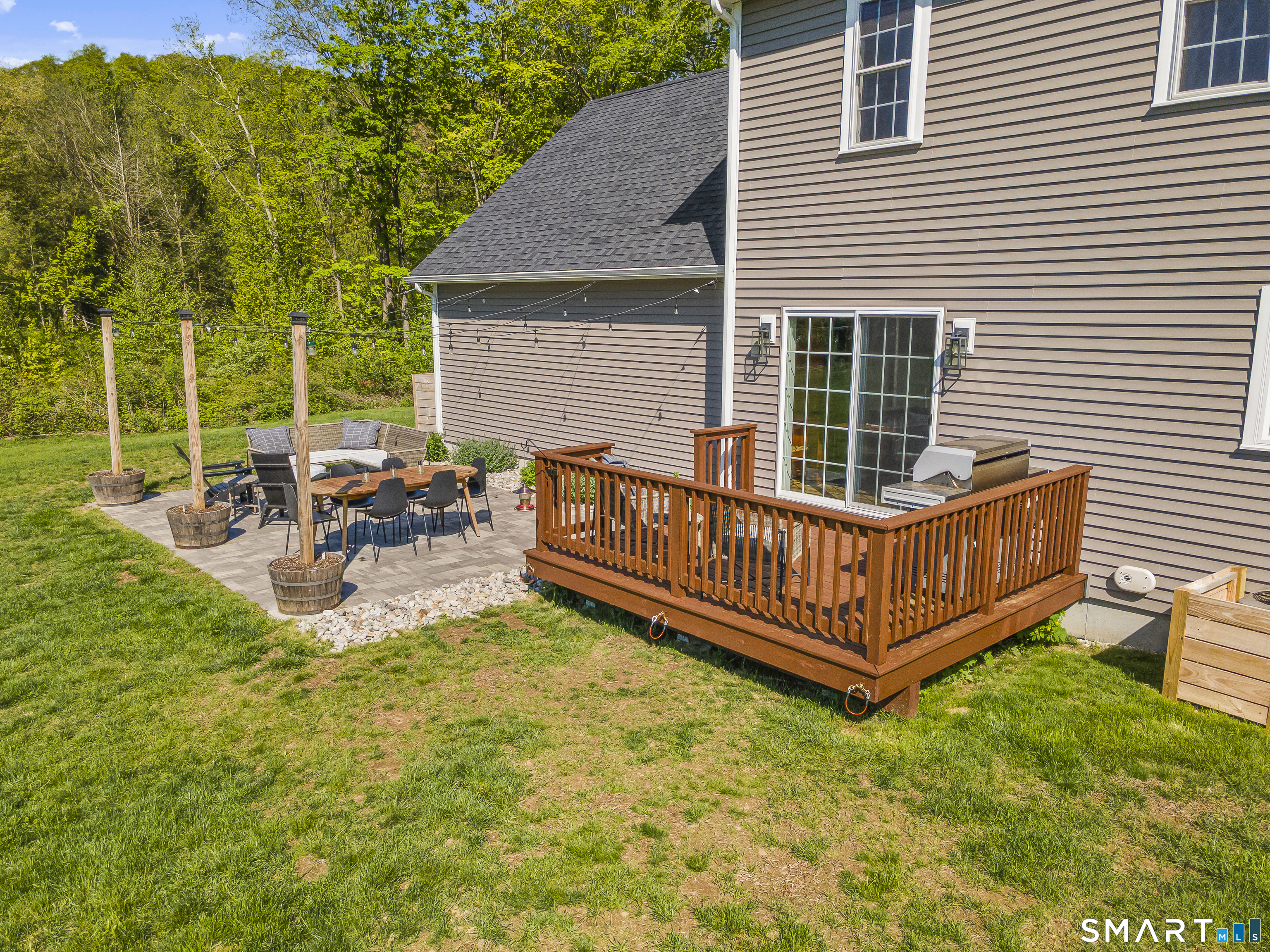 29 Beecher Road Brooklyn, CT 06234 - Photo 5 of 40 a view of a house with backyard and sitting area