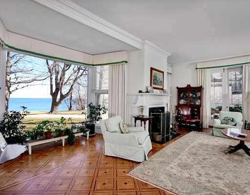 Undisclosed Address Darien, CT 06820 - Photo 5 of 9 a living room with furniture and a fireplace