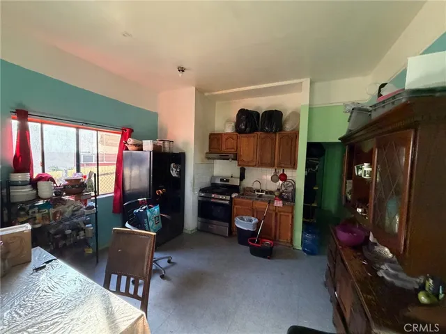 a room with furniture and a flat screen tv