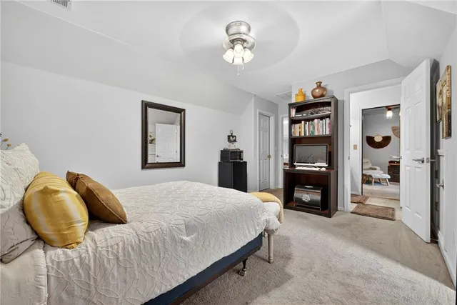 a bedroom with a bed and closet