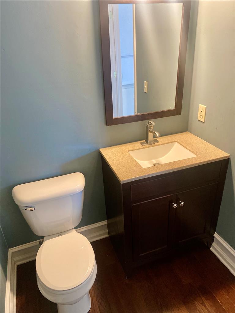 5494 Spring Ridge Drive West Macungie, PA 18062 - Photo 4 of 14 A single vanity with stone countertops highlights this functional powder room space.