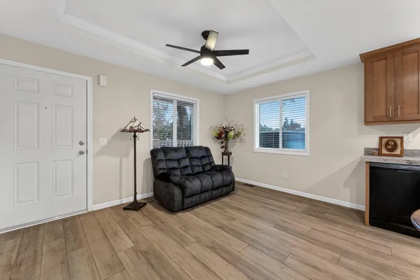 a living room with furniture and a window