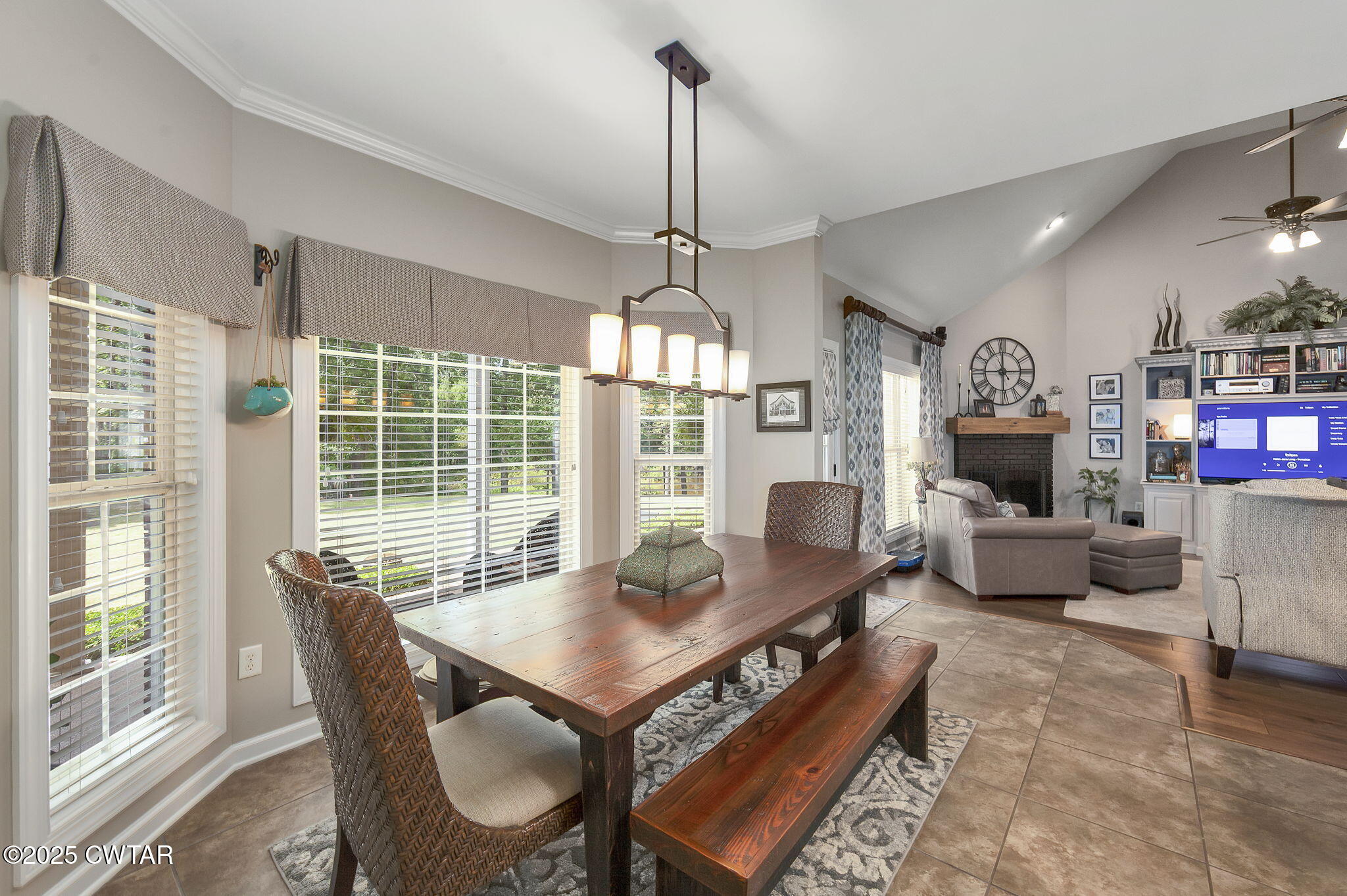 180 Medon Malesus Road Medon, TN 38356 - Photo 11 of 73 a living room with furniture a flat screen tv and a large window