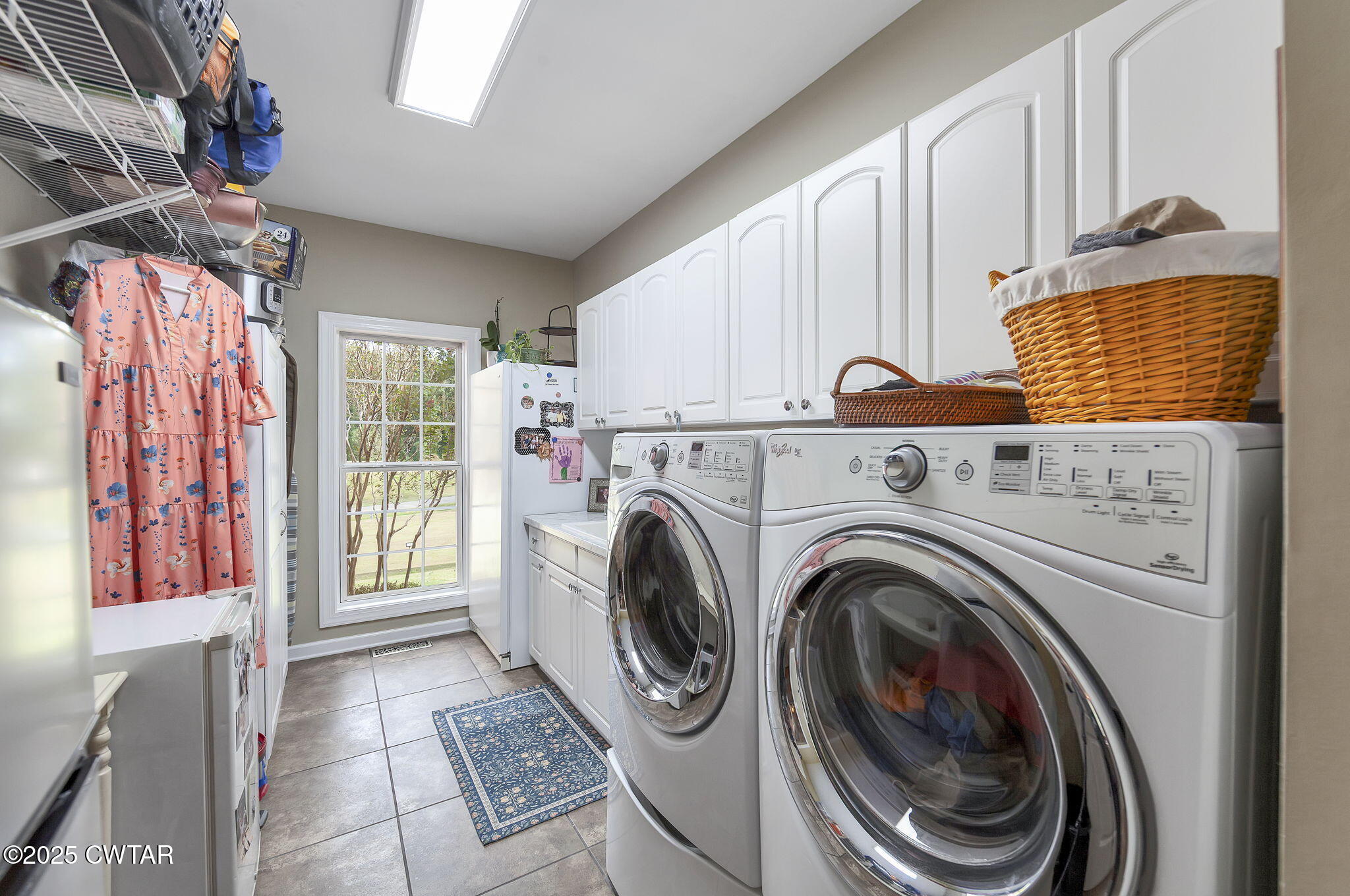 180 Medon Malesus Road Medon, TN 38356 - Photo 16 of 73 a view of a hallway with washer and dryer