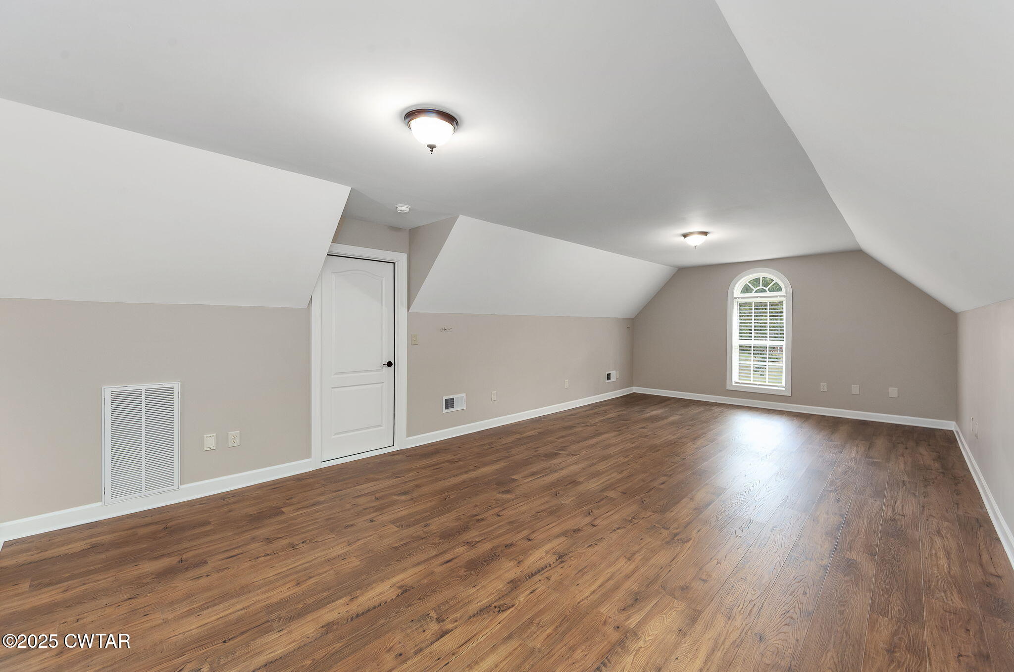180 Medon Malesus Road Medon, TN 38356 - Photo 28 of 73 a view of an empty room with wooden floor and a window