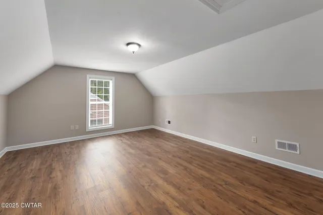 an aerial view of residential house with outdoor space