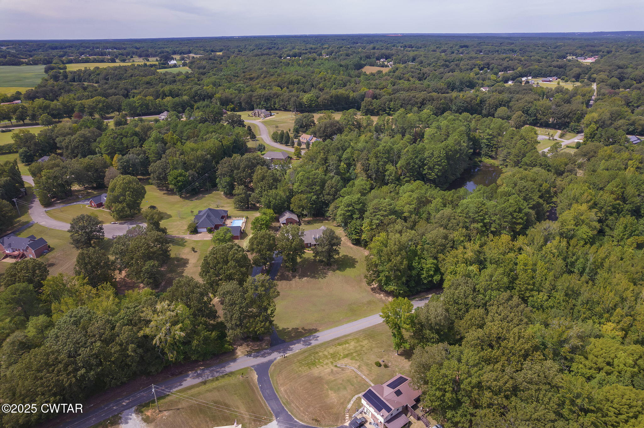 180 Medon Malesus Road Medon, TN 38356 - Photo 33 of 73 an aerial view of residential house with outdoor space and trees all around