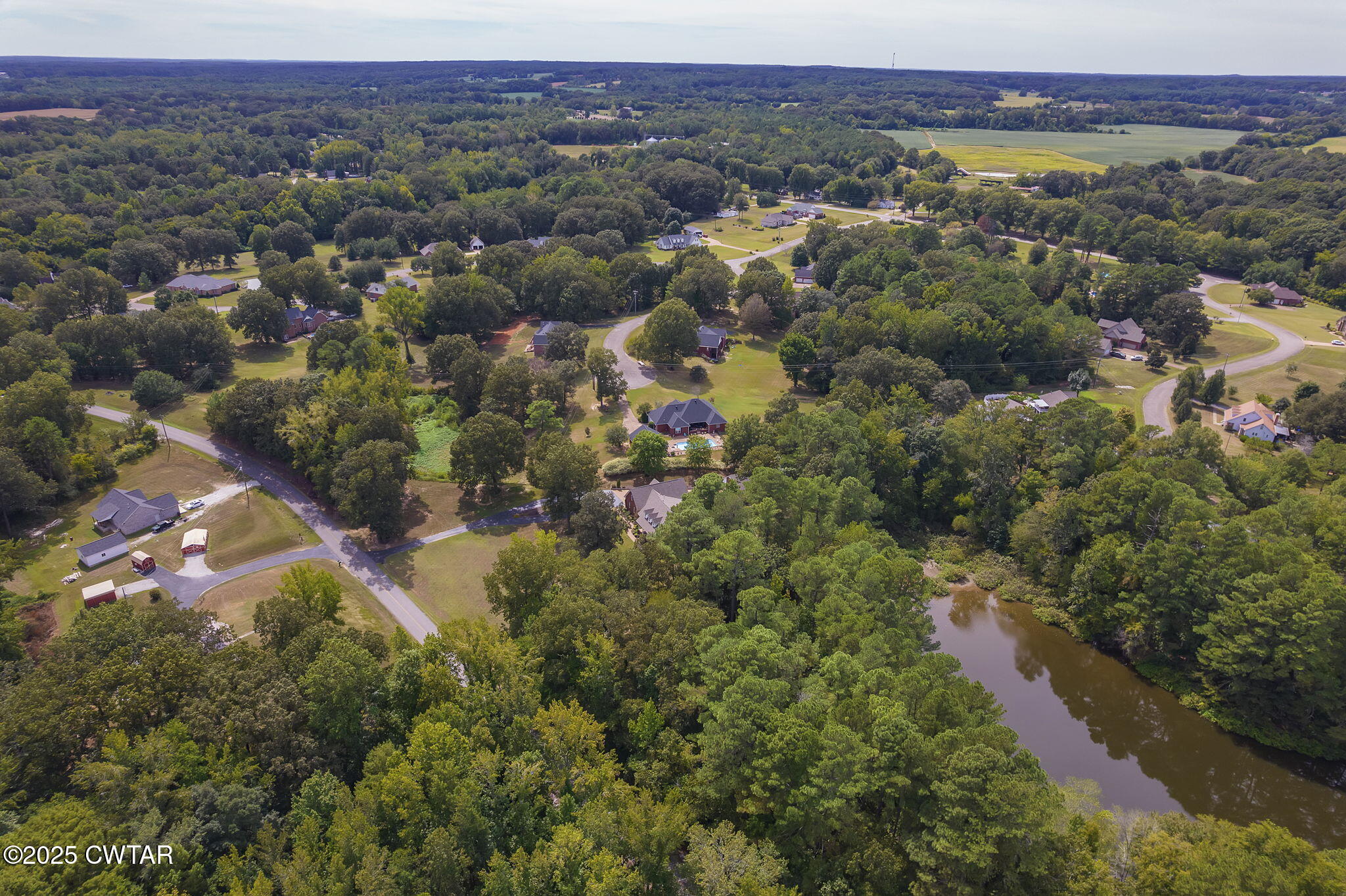 180 Medon Malesus Road Medon, TN 38356 - Photo 38 of 73 a view of a city with lush green forest