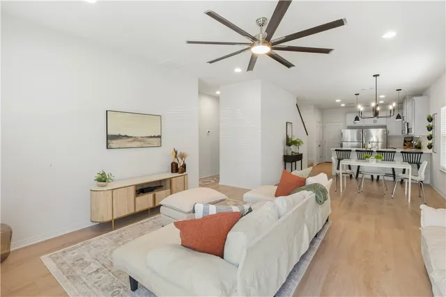 a living room with furniture and a table