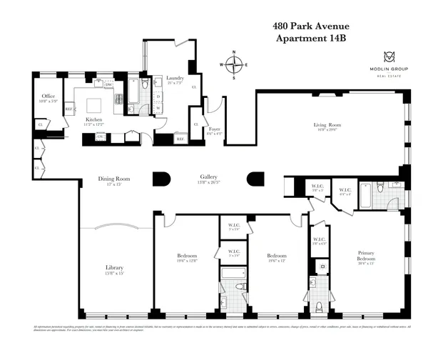 a living room with furniture a computer on the desk and a window
