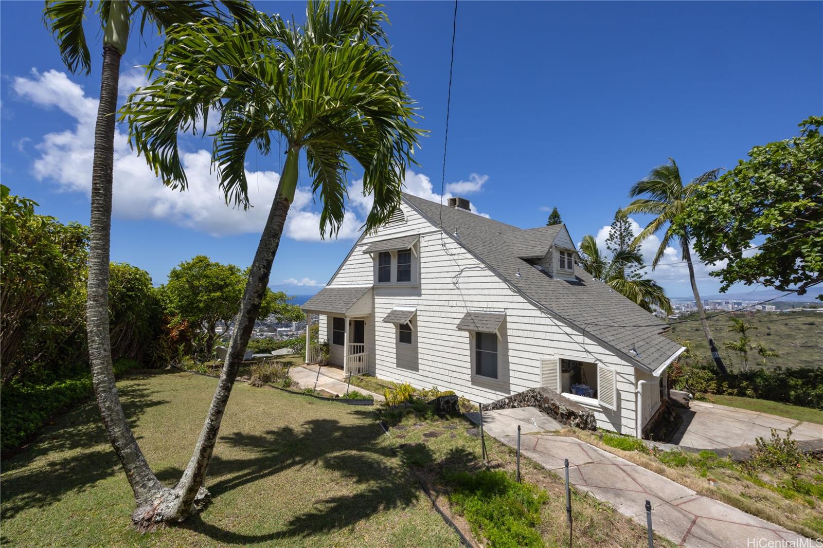 a house with trees in the background