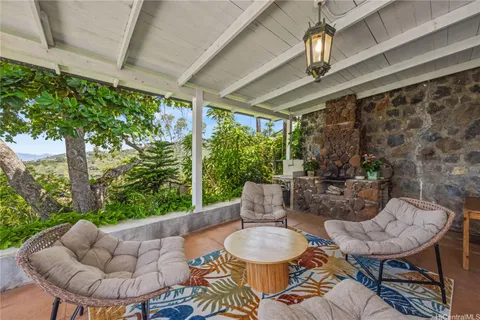 a outdoor living space with furniture and garden view