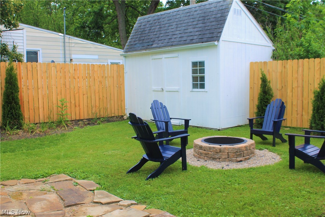 291 Cummings Road Vermilion, OH 44089 - Photo 4 of 24 Back Yard Fire Pit Area