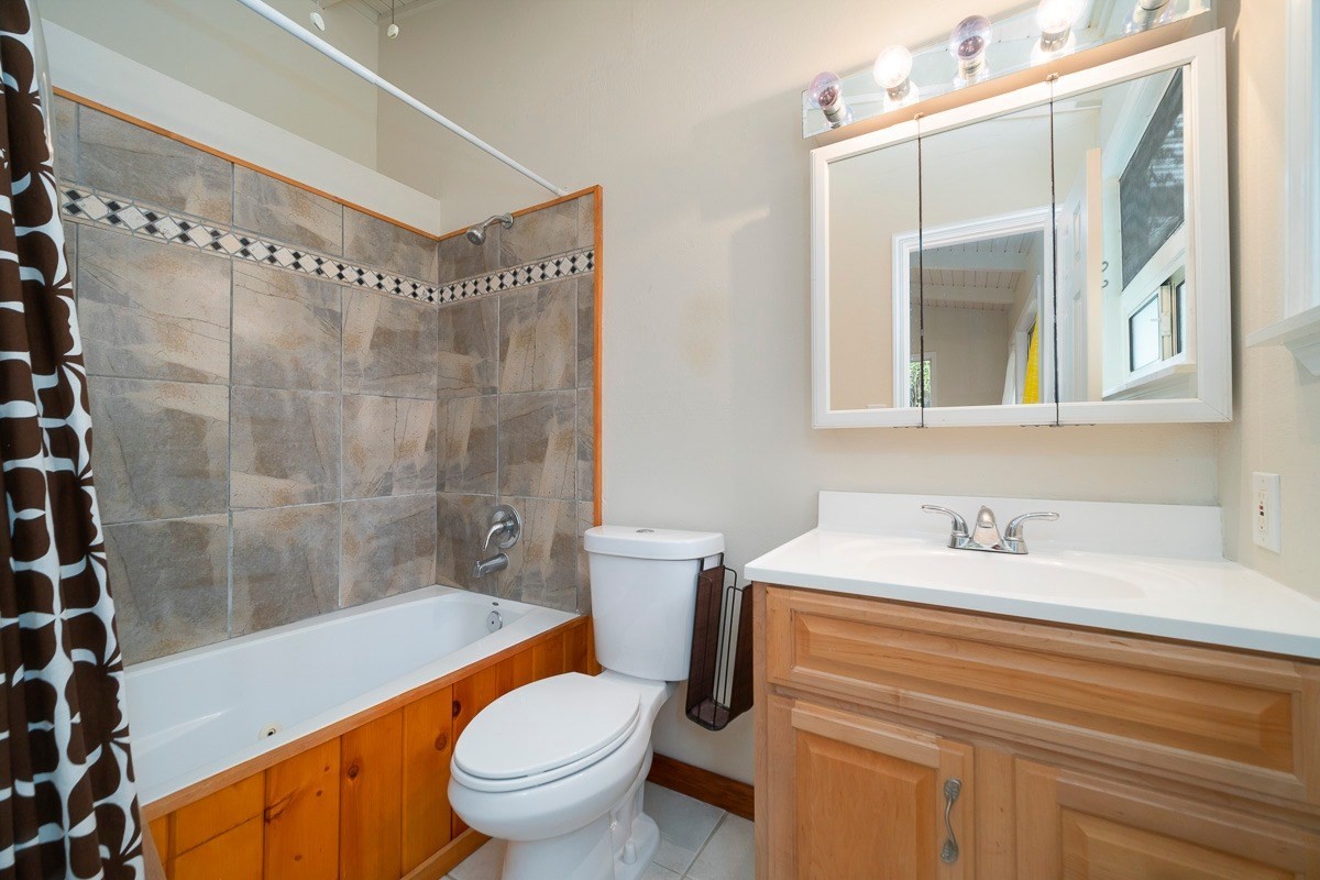 14-3508 Waimea Road Pahoa, HI 96778 - Photo 11 of 21 a bathroom with a sink toilet and shower