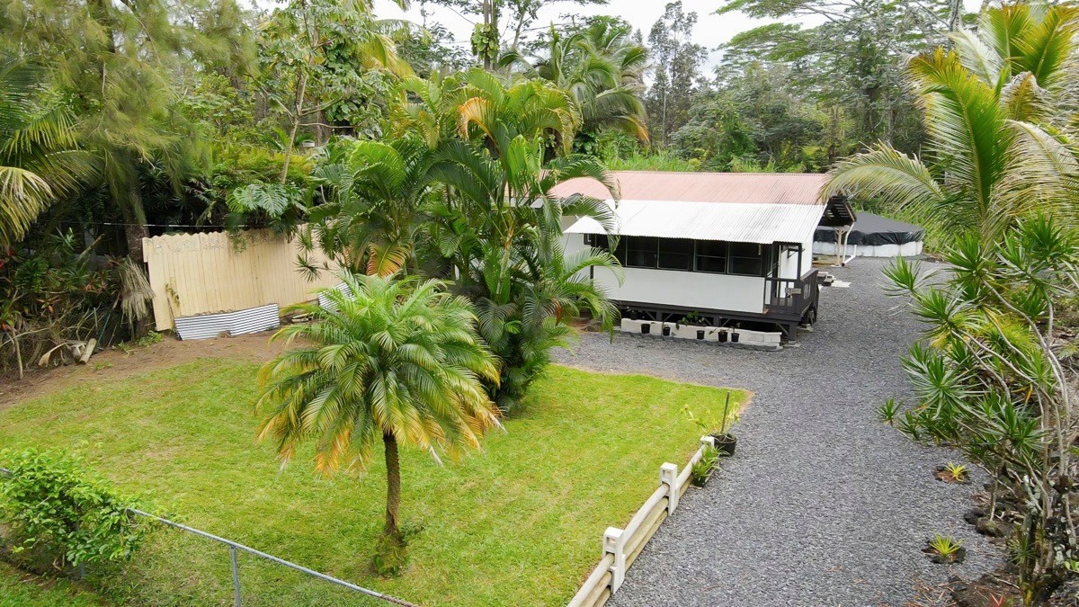 14-3508 Waimea Road Pahoa, HI 96778 - Photo 19 of 21 a view of a swimming pool with a patio