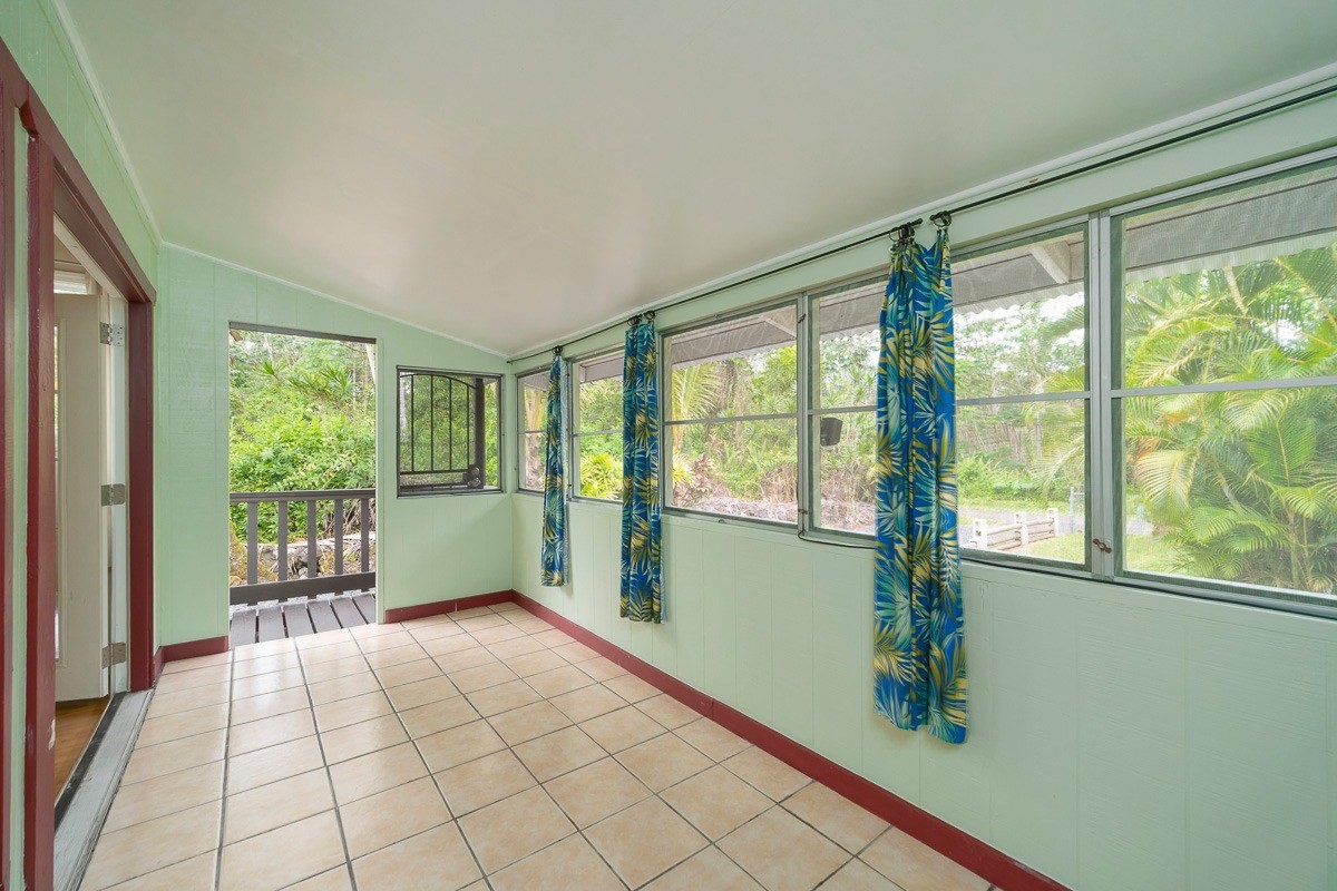14-3508 Waimea Road Pahoa, HI 96778 - Photo 3 of 21 a view of an empty room with a window