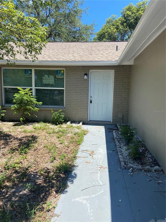 a front view of a house having yard