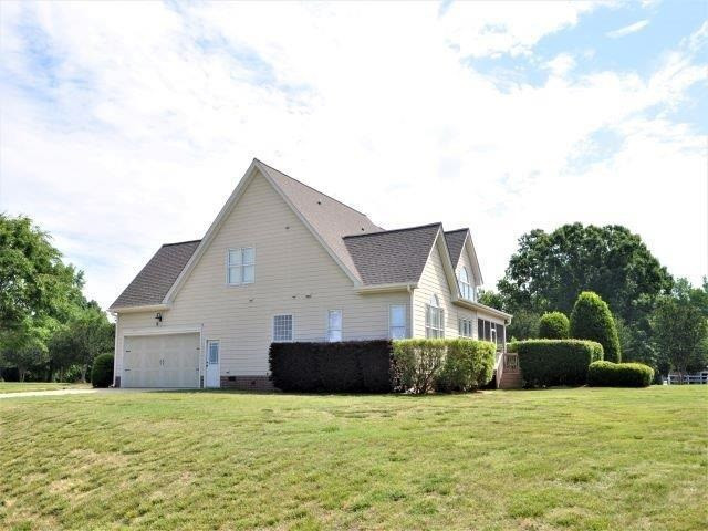 8701 Oregon Inlet Court Raleigh, NC 27603 - Photo 2 of 20 Exterior Side