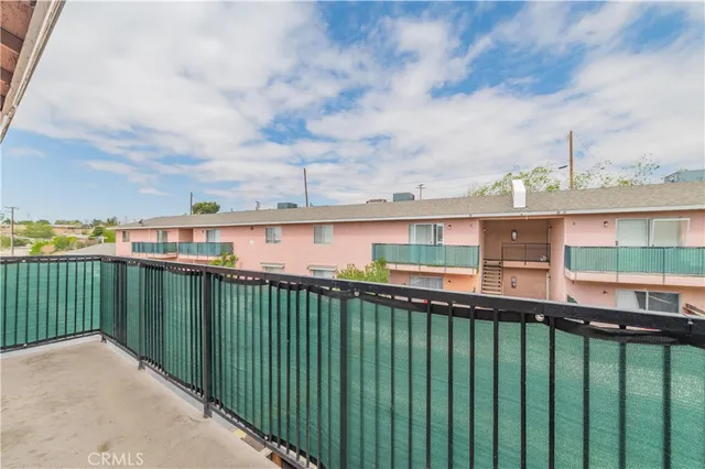 a view of a building from a balcony