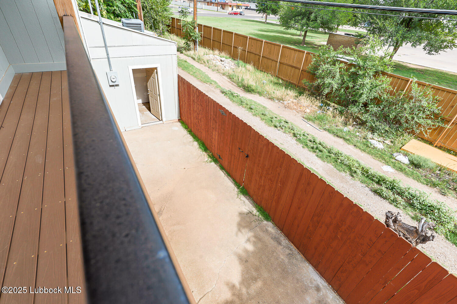 4314 52nd Street, Unit A Lubbock, TX 79413 - Photo 15 of 54 a view of balcony with wooden floor and outdoor space