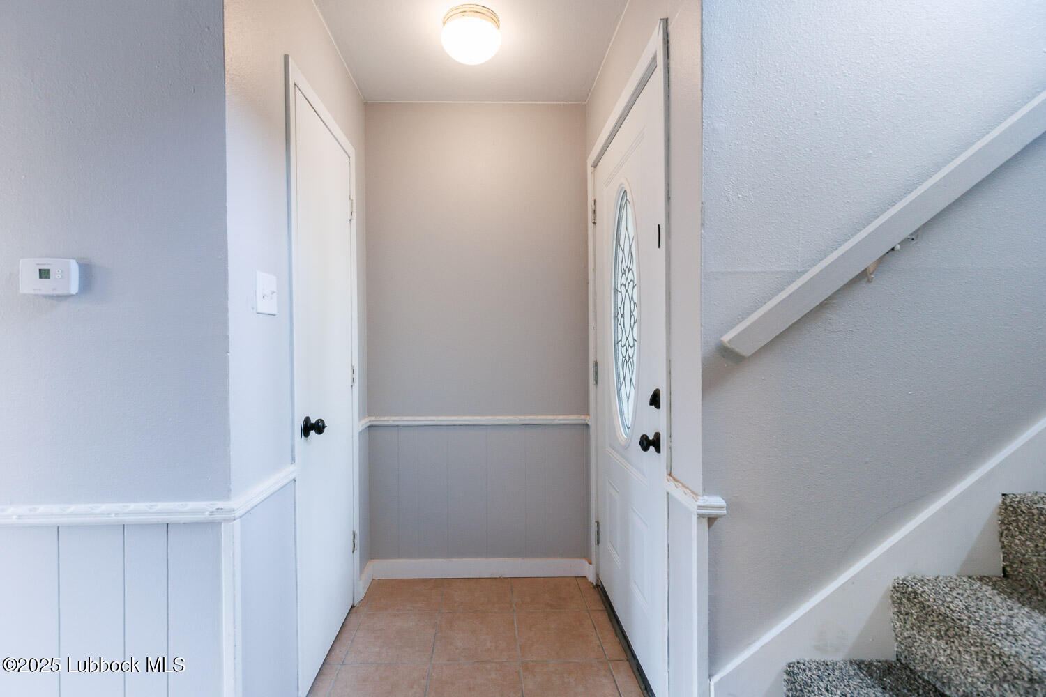 4314 52nd Street, Unit A Lubbock, TX 79413 - Photo 27 of 54 a view of entryway and kitchen